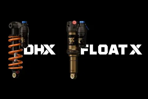 Two Fox bike suspension shocks, a coil DHX and an air FLOAT X, are displayed against a black background.