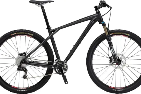 Sleek black GT Zaskar Carbon mountain bike with Kenda tires, Fox suspension fork, and WTB saddle, ready for any trail.